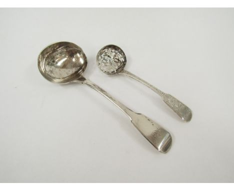A George Unite silver sifting spoon with all over engraved detail, Birmingham 1858 and George IV silver ladle, London 1827, 1