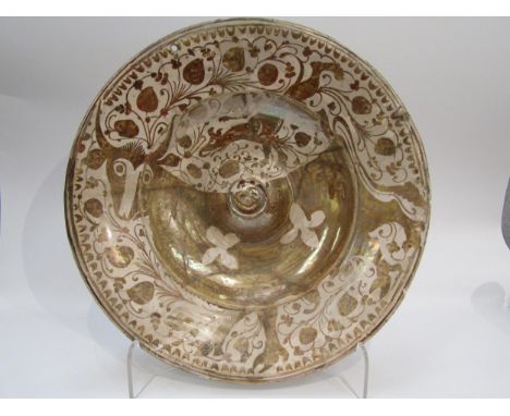 A 16th Century Hispano- Moresque lustre dish probably Valencia (Manises), south East Spain circa 1525- 75, with slightly rais