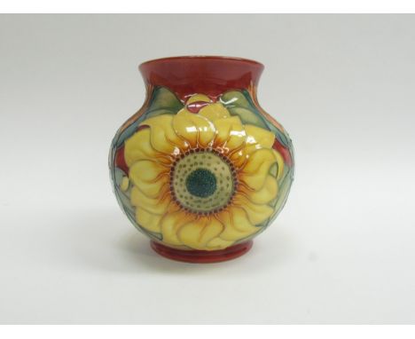 A Moorcroft Inca Sunflower pattern squat form vase, 15cm tall 