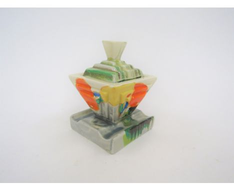 A Clarice Cliff Bizarre Art Deco inkwell and cover in the Delecia pattern, 11cm tall 