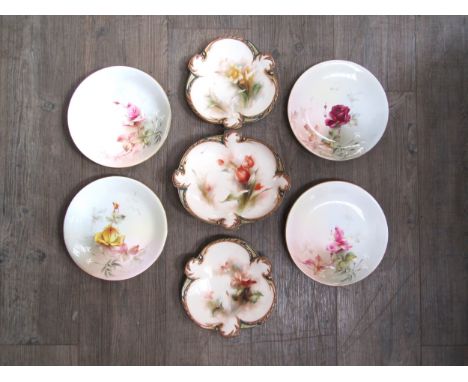 A set of four Royal Worcester plates depicting roses, together with three Harley’s Worcester cabinet plates with flowers (7) 