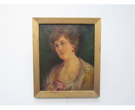 A Late 19th/Early 20th Century oil on canvas, portrait of Lady. Signed bottom left 'Ogilvie', possibly Frank Stanley Ogilvie 