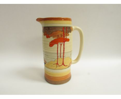 A Clarice Cliff Bizarre Lynton shape jug in the Coral Firs pattern, 28cm tall 