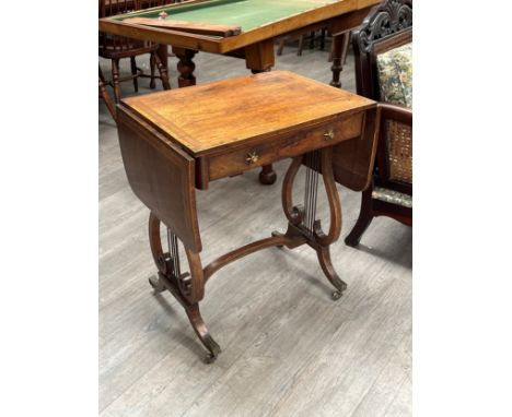 A Regency rosewood sofa table with single drawer, lyre ends and stretcher base, 74cm x 61cm flaps down x 46cm 