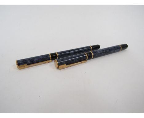 A pair of Waterman's fountain and ballpoint pens, the nib in gold, blue marbled design 