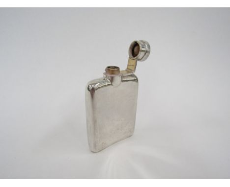 A William Neale Ltd silver hip flask with hinged stopper, plain ergonomic form, Birmingham 1917, 94g 