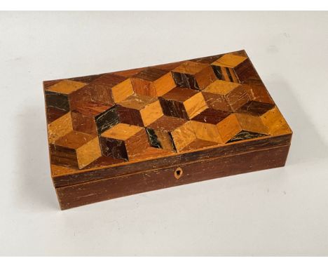 A parquetry games box with mother-of-pearl counter contents, fish, ovals and rectangles. The box being 6.5cm x 29.5cm x 17cm 