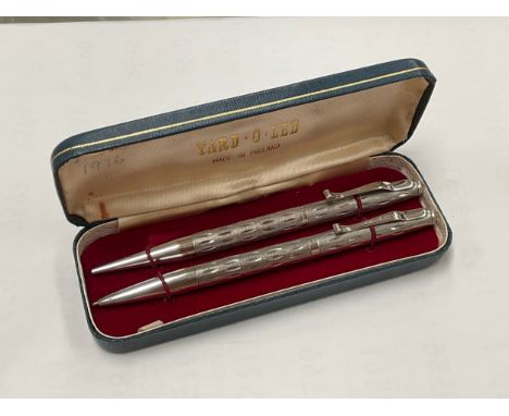 A Yard-O-Led silver propelling pencil and ballpoint pen set, cased 