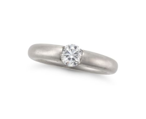 NIESSING, A DIAMOND SPANNRING RING tension set with a round brilliant cut diamond of approximately 0.61 carats, signed Niessi