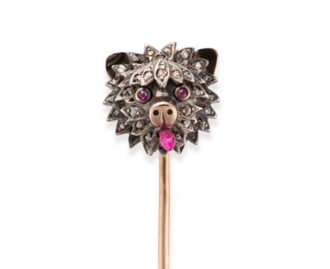 AN ANTIQUE FRENCH DIAMOND, RUBY AND ENAMEL STICK / TIE PIN in 18ct yellow gold and silver, designed as the head of a dog set 