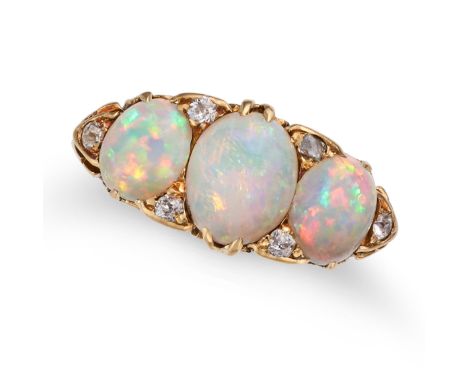 AN ANTIQUE OPAL AND DIAMOND RING in 18ct yellow gold, set with three oval cabochon opals accented by old cut diamonds, stampe