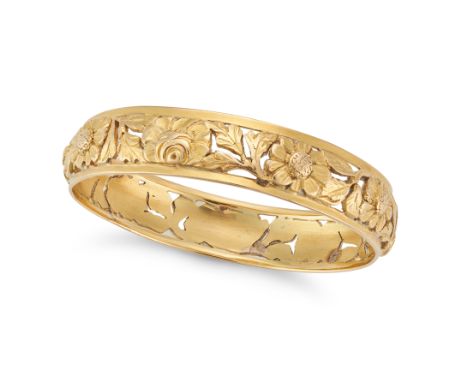 AN ANTIQUE FRENCH BANGLE in 18ct yellow gold, the openwork bangle in foliate design, French assay marks, inner circumference 
