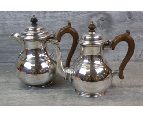 Mid 20th century silver teapot and coffee pot, baluster form with simple band decoration, wooden handles and finials, makers 