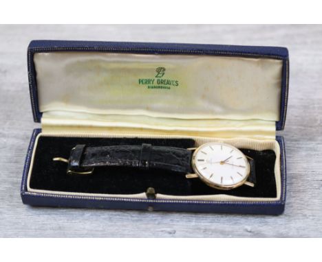 Gents Omega Geneve 9ct Gold wristwatch with sweep seconds hand &amp; baton markers, Omega logo to strap catch and winding Cro