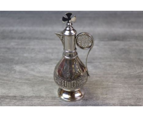 Edwardian silver Communion flagon of baluster form, engraved ivy leaf and patonce cross decoration to the body, patty cross f