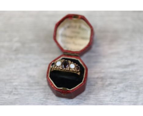 Victorian style garnet and opal boat head 9ct yellow gold ring, three garnets alternately set with white precious opal, the c