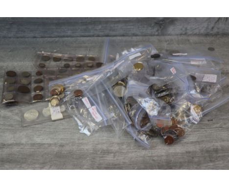 Bag of mixed World coinage to include Silver and including USA, Middle East, Europe etc plus a small collection of vintage Ba