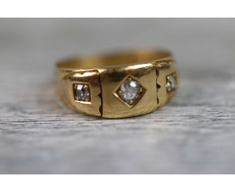 Victorian diamond three stone 18ct yellow gold ring, the central cushion cut diamond weighing approximately 0.10 carat, small