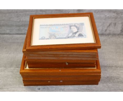 Fifteen framed &amp; glazed vintage UK Banknotes in mostly Uncirculated condition to include; Peppiatt £1, 10 Shillings, O'Br