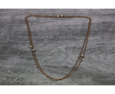 Pearl 9ct rose gold necklace, the fine belcher link chain with five evenly spaced spherical cream cultured pearls, diameter o
