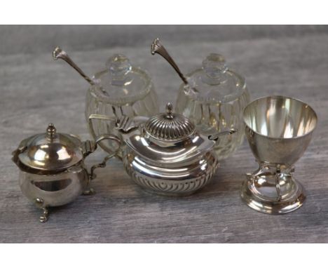 Silver mustard pot with repousse gadrooning to lower half, ogee style finial, blue glass liner, makers William Adams Ltd, Bir