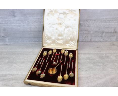 Late 19th century cased set of twelve French parcel-gilt silver teaspoons, sugar tongs and tea leaves strainer, the tea strai