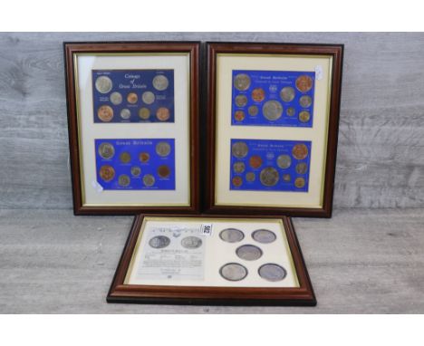 Three framed &amp; glazed coin sets to include a Morgan Dollar five coin set with COA