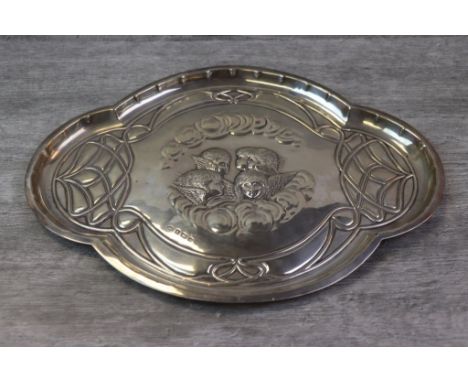 Art Nouveau silver tray of curved form with four repousse cherubs to centre and sinuous scroll decoration surround, crimped b