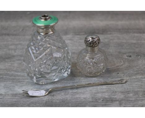 Silver pickle fork with scroll design to finial, James Swann &amp; Son, Birmingham 1924, a silver topped glass scent bottle (