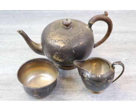 Goldsmiths and Silversmiths silver melon shaped tea pot and milk jug, wooden handle and finial to teapot, hallmarked London 1