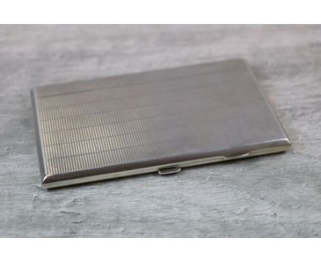 George V silver cigarette case, engine turned zigzag decoration in bands to front and back, gilt interior, hallmarked Sampson