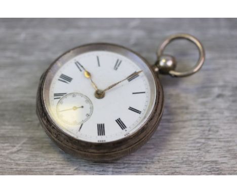 Victorian silver open faced key wind pocket watch, white enamel dial and subsidiary dial, black Arabic numerals, gilt poker h