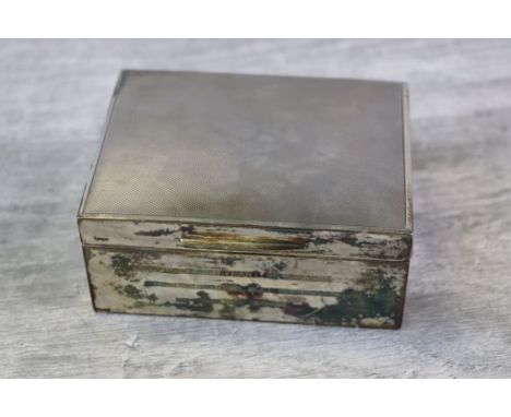 Mid twentieth century silver cigarette box with presentation inscription "Flight Lieutenant M.B. Moore From the Officers R.A.