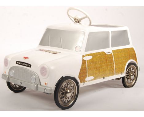 A rare vintage 1960's Leeway made ' Mini Cooper S ' child's pedal car. White plastic body, with silver painted trim and wood-