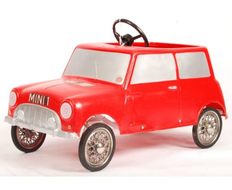 A rare vintage 1960's Leeway made Mini Cooper child's pedal car. Red plastic body, with silver painted trim - including front