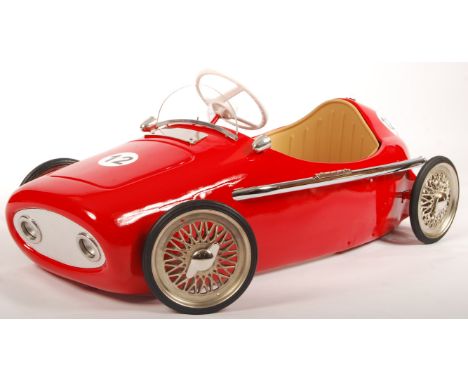 A rare original vintage 1960's Morellet & Guerineau made child's pedal car. In red, with No.12 decals. Chrome exhaust, with t