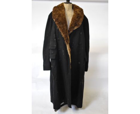 A vintage Army & Navy full length navy blue wool motoring overcoat with musquash and shearling lamb fur lining        Conditi