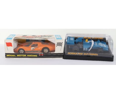 Lot no: Two boxed vintage Scalextric Racing cars, 1970s, C.18 Ford 3L-GT Foreign Motor orange, good condition, box good, tear