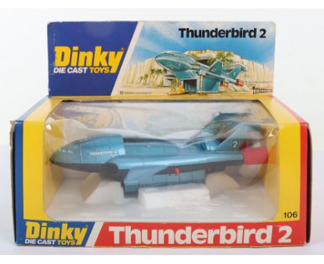 Dinky Toys 106 Thunderbirds 2 with Thunderbirds 4, metallic blue body, black plastic base, red legs, in near mint original co