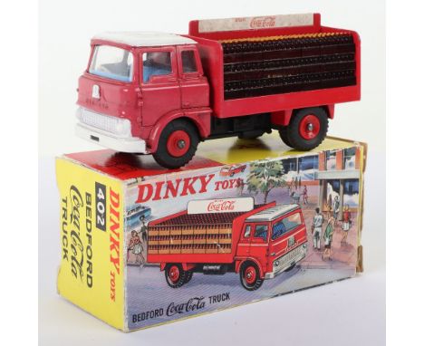 Dinky Toys 402 Bedford ‘Coca-Cola’ Truck, red cab and back, blue interior, white roof, grill and front bumper, red plastic wh