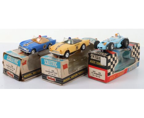 Three Boxed Race Tuned Scalextric’s Slot Cars, C84 Triumph TR 4A, blue plastic body, complete, C83 Sunbeam Tiger, yellow plas