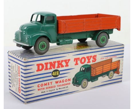 Dinky Toys 418 Leyland Comet Wagon with hinged tailboard, green cab/chassis, orange back, pale green ridged wheel hubs, in ne