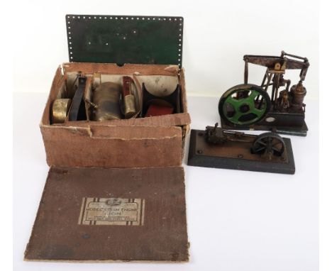 A live steam model of a Beam engine, 1930s, with single cylinder and mounted beam operating a green painted spoked flywheel, 