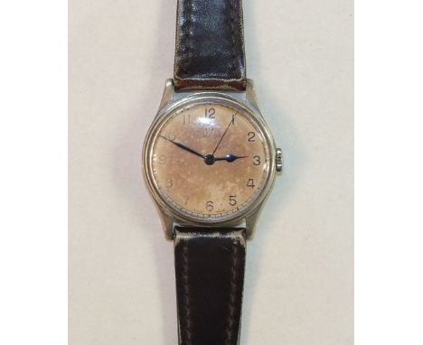 Omega, a WWII military wrist watch Calibre 30T2, the cream dial, (discoloured), with Arabic numerals and centre sweep seconds