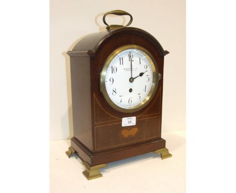 Barraud & Lunds, an inlaid mahogany mantel timepiece with white enamelled dial, single fusee movement and adjustable pendulum