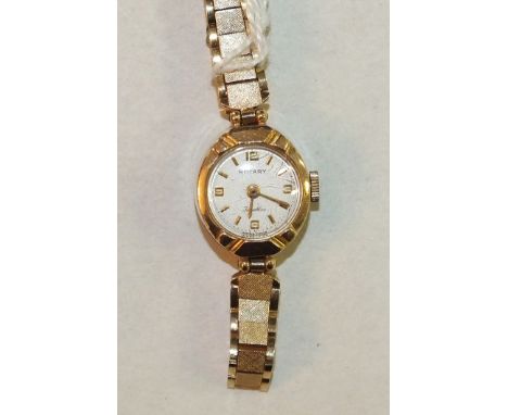 Rotary, a ladies 9ct-gold-cased wrist watch on 9ct gold tapering bracelet, 14.1g.