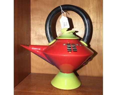 A Richard Godfrey studio pottery teapot of squat geometric form, having a red ground with black and white rectangular decorat