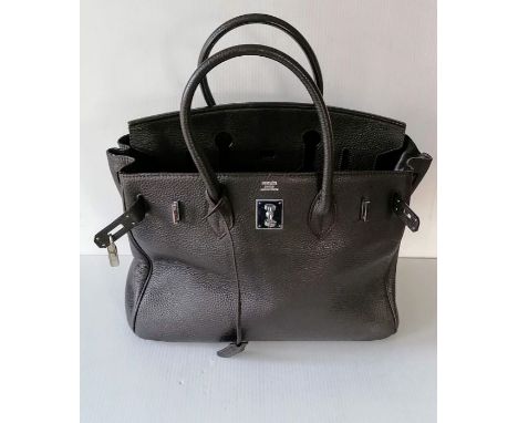 A Hermes-style Birkin 30 bag in chocolate brown leather, double handles, silver hardware, flap closure, lined interior, stamp