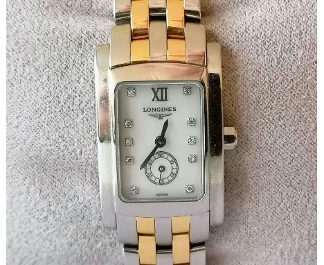 A Longines Dolcevita ladies diamond watch, white face 18mm, sword hands, subsidiary seconds hand, stainless steel case and tw