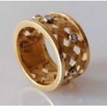 An Ole Lynggaard gold and diamond lattice ring, size N, stamped 750 and signed Ole